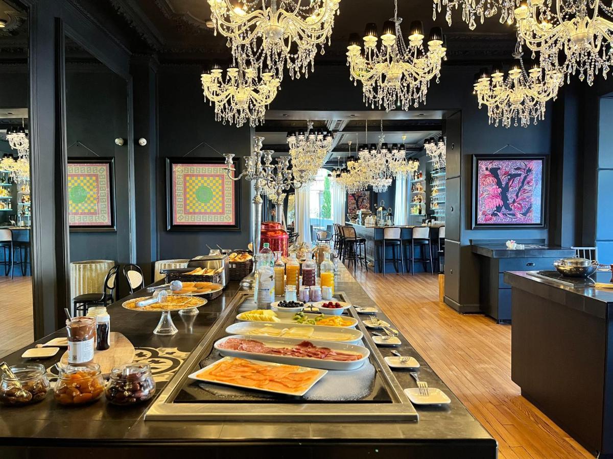 Belfry & Spa By Ligne St Barth 루르드 외부 사진 The buffet at the restaurant